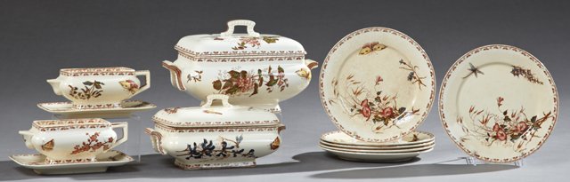 Ten Piece Partial Dining Set of French Ironstone,: Ten Piece Partial Dining Set of French Ironstone, consisting of two large covered dishes, 6 dinner plates, and two sauce boats on integral stands, all with floral and butterfly decoration and stencile