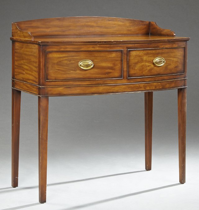 Diminutive English Hepplewhite Style Carved Walnut: Diminutive English Hepplewhite Style Carved Walnut Bowfront Sideboard, 20th c., the arched backsplash over a curved top above two drawers, on tapered square legs, H.- 42 1/4 in., W.- 41 1/2 in., D.- 2