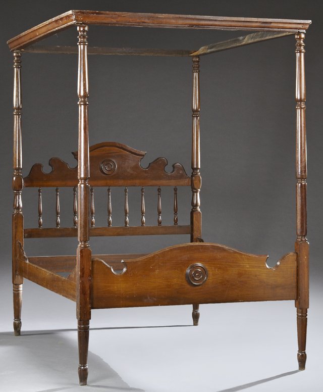 American Late Victorian Carved Walnut Full Tester Bed,: American Late Victorian Carved Walnut Full Tester Bed, late 19th c., the stepped tester on ring turned tapered posts, joining a serpentine arched roundel spindled headboard, joined by shaped rails to