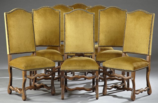 Set of Eight French Louis XIII Style Carved Beech: Set of Eight French Louis XIII Style Carved Beech Dining Chairs, 19th c., the arched upholstered high backs over square seats on serpentine legs joined by serpentine H-form stretchers, in gold velour 
