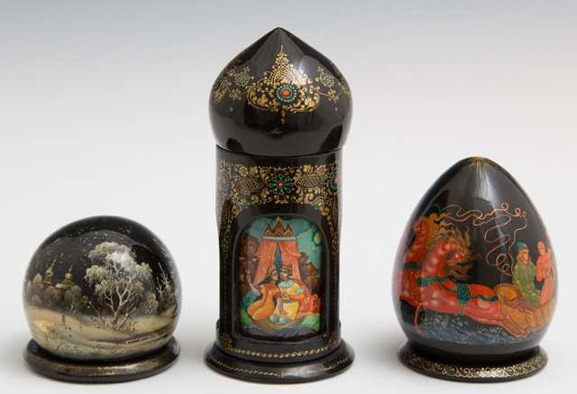 Three Russian Hand-Painted Black Lacquer Dresser Boxes,: Three Russian Hand-Painted Black Lacquer Dresser Boxes, c. 1996, one of egg form, signed and dated; one of globe form; one of onion dome form with a rotating windowed lid, Onion- H.- 4 1/4 in., Dia.- 