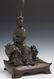 Oriental Patinated Bronze Figure of a Guan Yin atop a