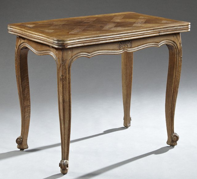 Diminutive French Provincial Louis XV Style Parquetry: Diminutive French Provincial Louis XV Style Parquetry Inlaid Oak Draw Leaf Table, early 20th c., the basket inlaid rectangular top, on cabriole legs to scrolled feet joined by a wide shell fan carved