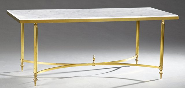 French Louis XVI Style Gilt Bronze Marble Top Coffee: French Louis XVI Style Gilt Bronze Marble Top Coffee Table, 20th c., the highly figured rectangular inset white marble on fluted legs to French toes joined by a concave-form stretcher centered by a fi