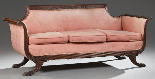 Duncan Phyfe Style Carved Mahogany Sofa, 20th c., the: Duncan Phyfe Style Carved Mahogany Sofa, 20th c., the relief ribbon decorated crest rail over triple cushions, within wheat carved curved arms, on splayed legs with ormolu paw feet, H.- 33 1/2 in., W.