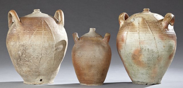 Group of Three French Provincial Earthenware Wine Jars,: Group of Three French Provincial Earthenware Wine Jars, 19th c., each with integral ring handles, one glazed, Glazed- H.- 18 in., Dia.- 13 1/2 in.
