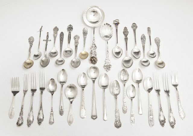 Group of Thirty-Three Pieces of Sterling, 20th c.,: Group of Thirty-Three Pieces of Sterling, 20th c., consisting of 22 souvenir demitasse spoons; 4 cocktail forks by Watson; 1 cocktail fork by Blackinton; a child's fork and spoon by Mauser; an olive f