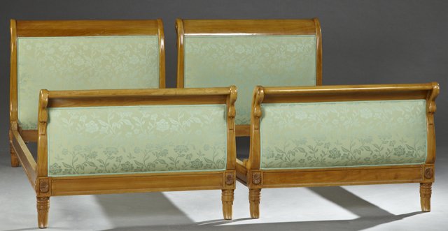 Pair of French Empire Carved Cherry Beds, 19th c., the: Pair of French Empire Carved Cherry Beds, 19th c., the sleigh ends with pierced carved swan decoration and upholstered panels, on turned carved tusk form feet, H.- 36 in., Interior W.- 35 in., Interio