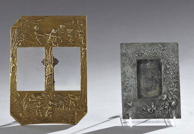Group of Two French Metal Picture Frames, 20th c., one: Group of Two French Metal Picture Frames, 20th c., one of pewter with relief insects and flowers; one a bronze double easel frame with relief children in a landscape, Bronze- H.- 9 1/4 in., W.- 6 5/8