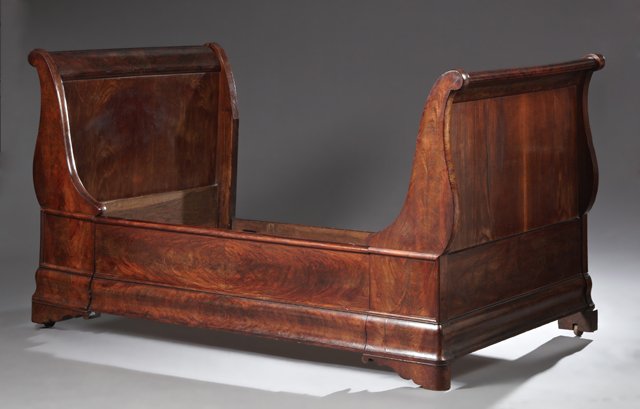 French Empire Carved Mahogany Lit du Coin, 19th c., the: French Empire Carved Mahogany Lit du Coin, 19th c., the scrolled ends joined by a wide stepped front rail, H.- 44 in., W.- 40 1/2 in., D.- 73 in.