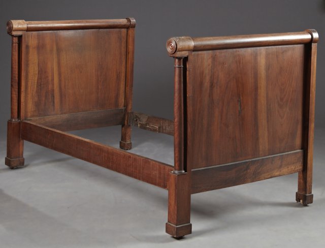 French Empire Walnut Lit du Coin, late 19th c.: French Empire Walnut Lit du Coin, late 19th c., the head and foot with cylindrical crest rails, H.- 42 1/2 in., W.- 71 1/2 in., D.- 42 3/4 in.