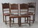 Set of Four French Henri II Style Carved Walnut Dining