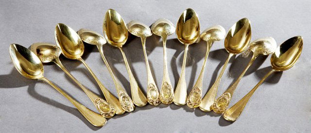 Set of Twelve French Gold Plated Second Standard Silver: Set of Twelve French Gold Plated Second Standard Silver Teaspoons, 20th c., by C&G, with relief handles, monogrammed KC, H.- 5 3/4 in., Wt.-7.25 troy oz.