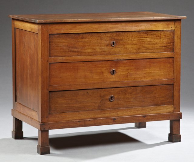 Louis Philippe Carved Walnut Commode, 19th c., with: Louis Philippe Carved Walnut Commode, 19th c., with three drawers, on square legs on block feet, H.- 34 1/2 in., W.- 42 5/8 in., D.- 23 1/8 in.