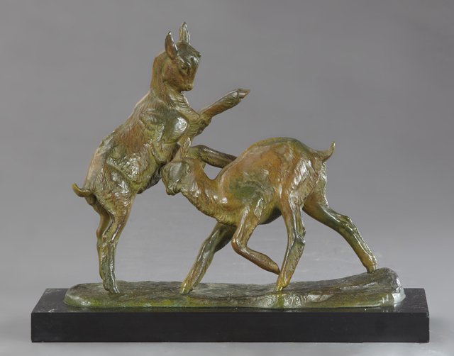 Irenee Rochard (1906-1984, France), "Two Goats at: Irenee Rochard (1906-1984, France), "Two Goats at Play," 20th c., patinated bronze figural group, signed right front, on a black marble base, H.- 12 in., W.- 15 in., D.- 5 3/8 in.