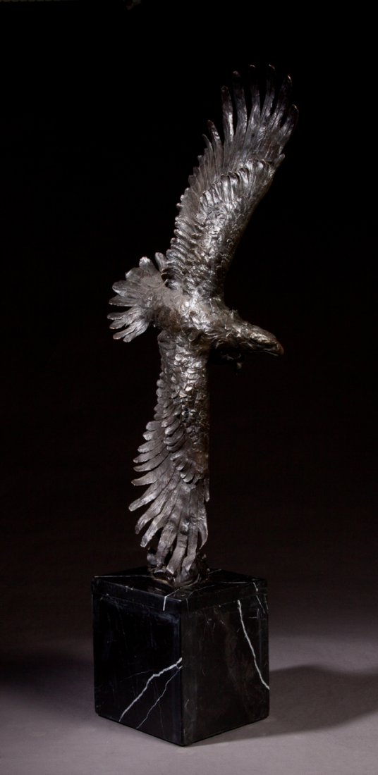 Patinated Bronze Eagle in Flight, 20th c., on a highly (1 of 2)
