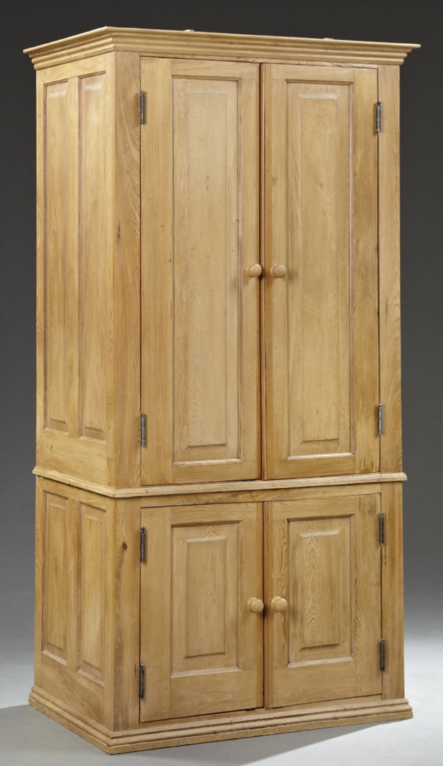 Southern American Cypress Cupboard, 20th c., probably: Southern American Cypress Cupboard, 20th c., probably New Orleans, the stepped ogee crown above two long fielded panel doors on a base with two fielded panel doors, flanked by fielded side panels, on 