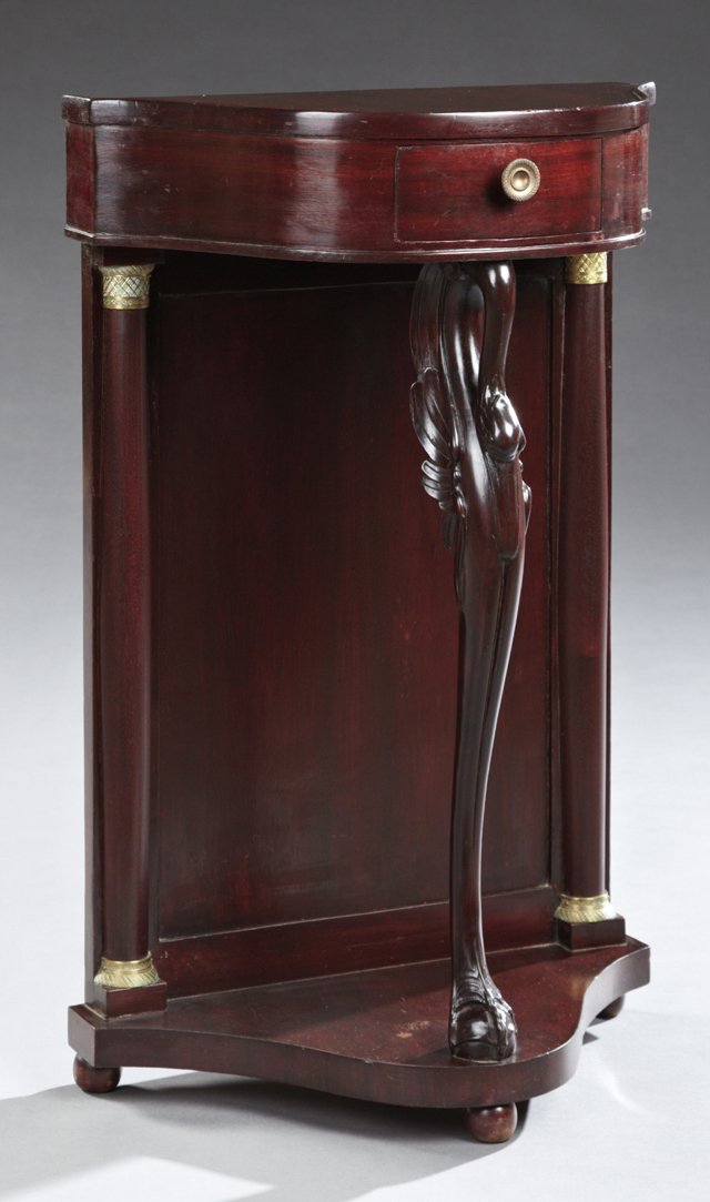 Ormolu Mounted Empire Style Carved Mahogany Bowed: Ormolu Mounted Empire Style Carved Mahogany Bowed Nightstand, 19th c., the galleried top with a center drawer on a swan's head support, the back with ormolu mounted engaged columns to a lower bowed sh