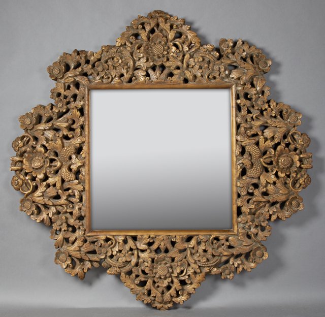 Hollywood Regency Style Gilt Composition Overmantel: Hollywood Regency Style Gilt Composition Overmantel Mirror, 20th c., by Phyllis Morris, Beverly Hills, the wide pierced frame with relief floral and leaf decoration, around a square plate, H.- 59 in.,