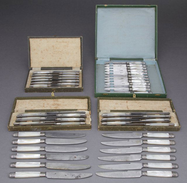 Four Cased Sets of French Knives, 19th c., with: Four Cased Sets of French Knives, 19th c., with mother-of-pearl handles, consisting of a set of 24 in three boxes; a cased set of 12 marked Paris; and a set of 12. (48 Pcs.)