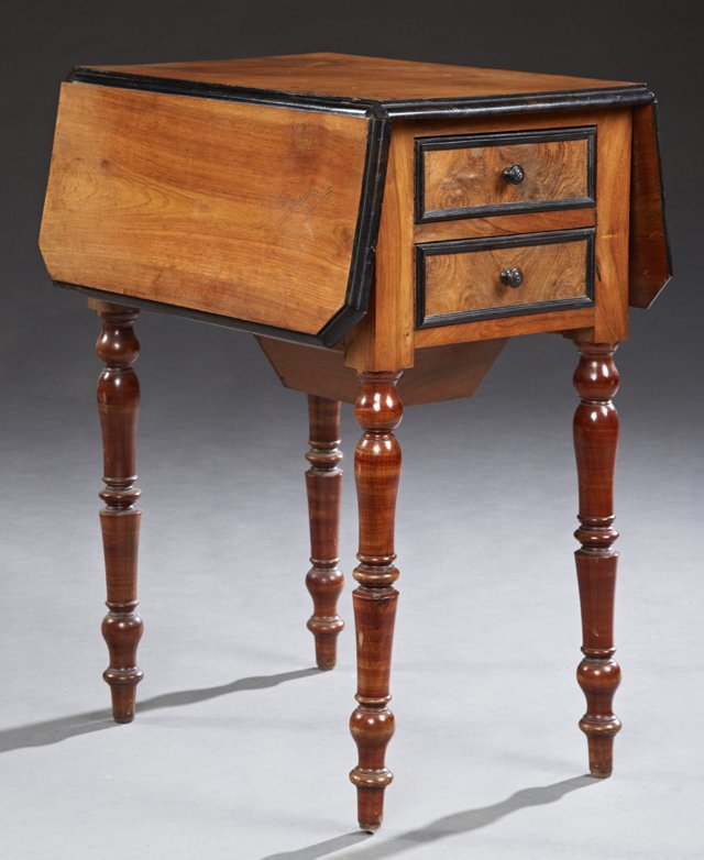French Louis XVI Style Carved Walnut Drop Leaf Work: French Louis XVI Style Carved Walnut Drop Leaf Work Table, c. 1880, one end with two small drawers, the other a fall front pot cupboard, with ebonized accents, on turned tapered legs, H.- 27 1/2 in.,