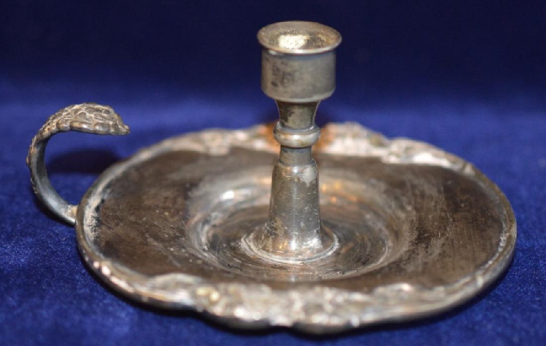 Victorian Taper Candle Holder With Finger Ring: Victorian Silverplate Taper Candle Holder with Finger Ring with ornamental Tray measures 3 1/4 inches wide x 2 inches high. Opening is 1/2 inches for old time taper. Stamped on bottom Quadrupe 1205