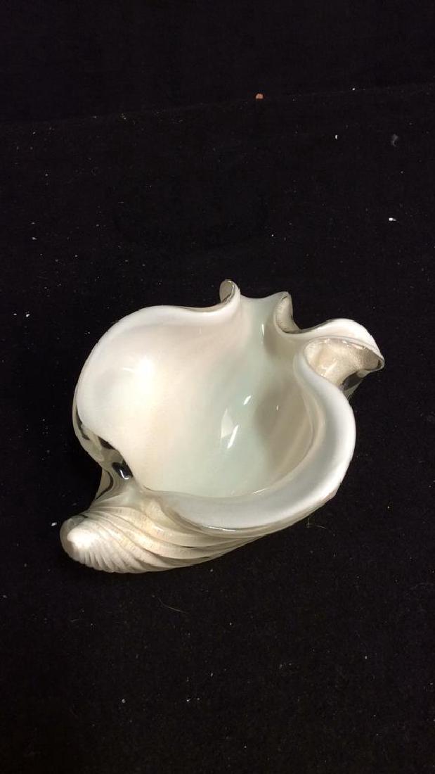 Vintage Murano Glass Shell Decorative Piece This: This scallop edged Murano piece measures app 4 inches high, app 7 inches long and 6 inches wide. Opaque cream colored inside shell with translucent clear glass outer overlay, delicate gold colored spe