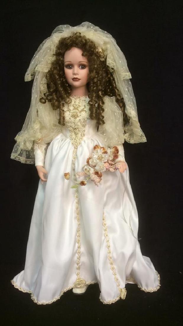 Porcelain Lasting Moment Doll in Wedding Dress Florence: Florence Maranuk Collection Porcelain doll 'Lasting Moment'. Beaded satin dress with Lace veil. Numbered and comes with original box and Certificate of Authenticity. Measures approx 26 inches tall. Fi