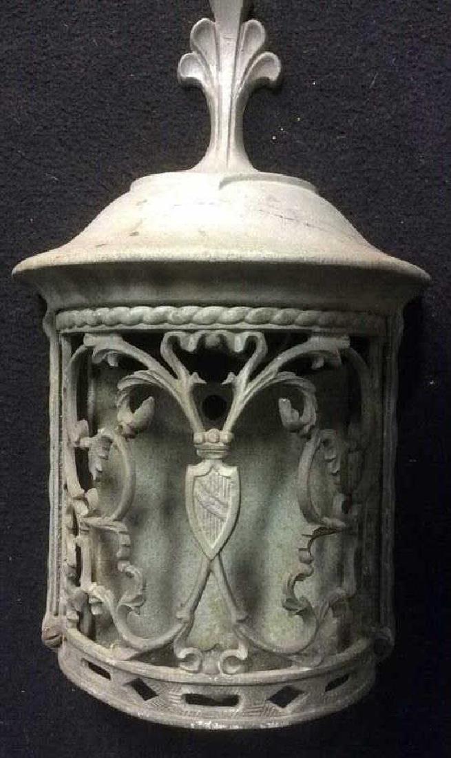 Ornate Scroll Design Metal Indoor Outdoor Sconce: Silver/Grey color, scroll and shield design sconce; could be indoor or outdoor. Measures approx 13 inches tall by approx 6 inches wide. Lighting Fixture Sconce