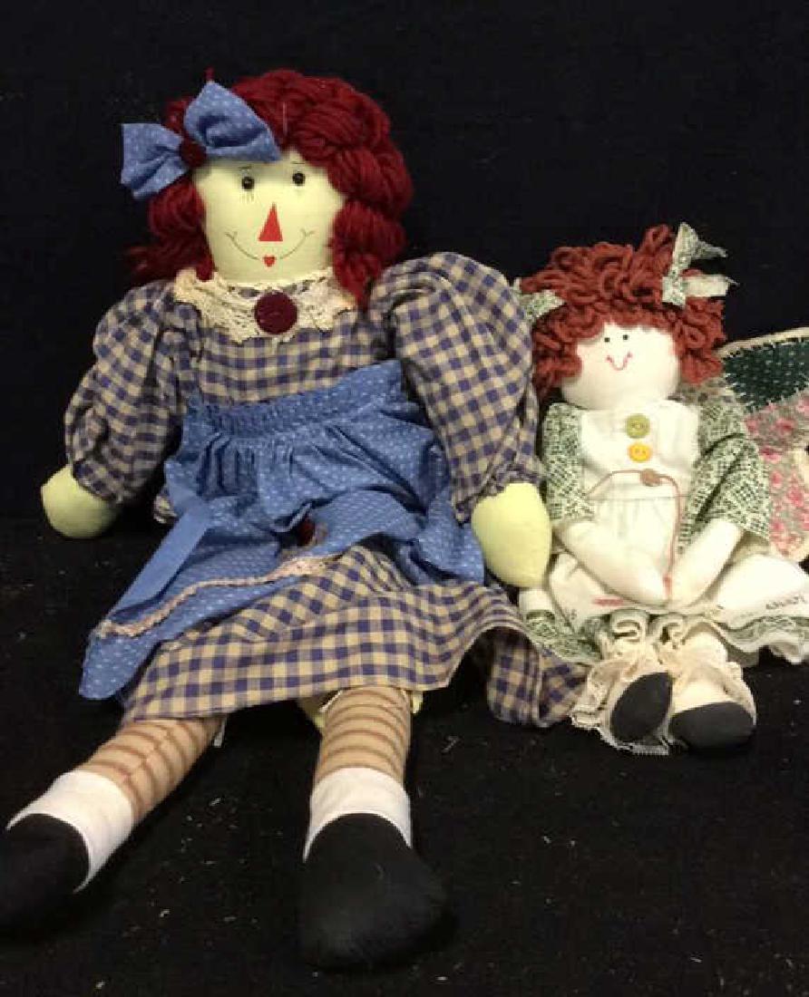 Raggedy Anne Doll And Soft Fabric Angel Two Fabric: Two Fabric dolls Collectibles. Raggedy Ann measures ht App 22 inches.