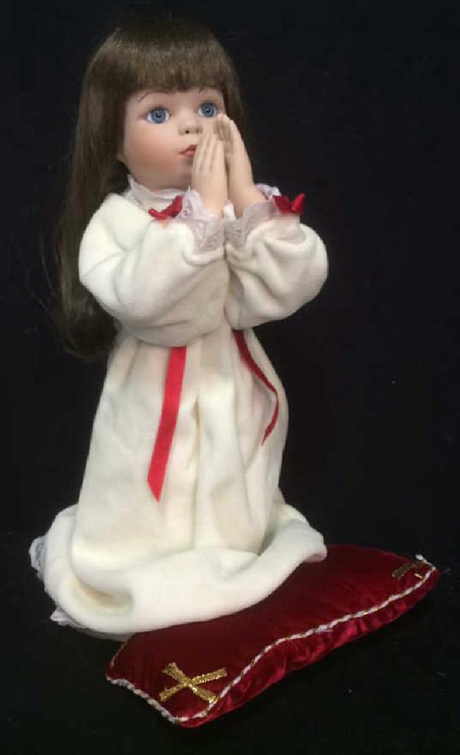 Praying porcelain doll 2025