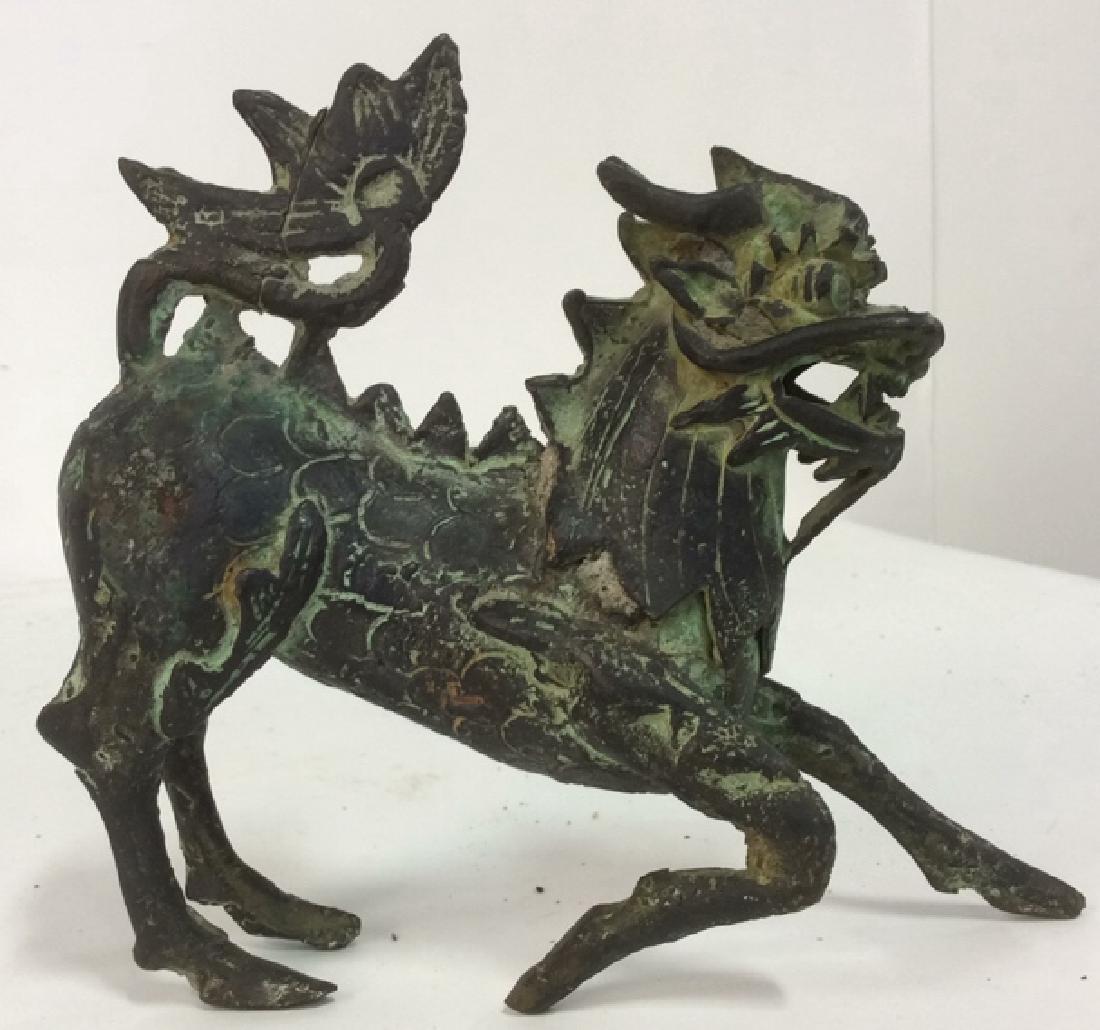 Asian Metal Dragon Sculpture: Asian metal Dragon Sculpture with pale green patina. Tail has repair Measures approx 6 inches tall and 6 inches wide. Property of Rye estate. Tabletop Decor Dragon Asian Art