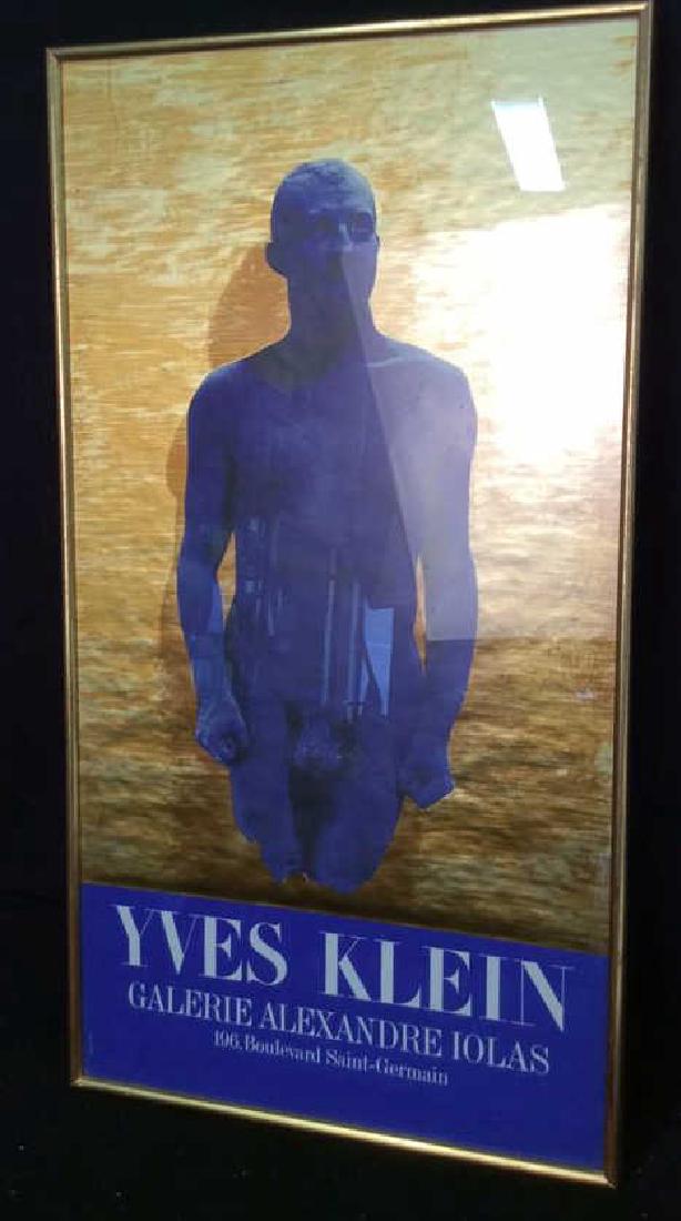 Vintage Framed Yvette Klein Exhibit Poster Paris: Vintage Framed Poster in gold leafed wood frame blue and gold , male nude, reads Galerie Alexandre Iola's, 196 Boukevard Saint Germaine. From the Collection of Dr George New Pratt Institute. Measures 