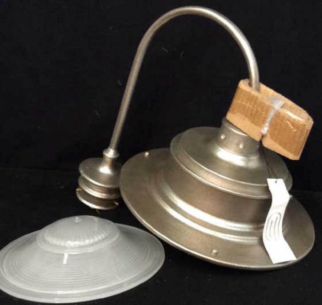 New Troy Lighting Aluminum Light post Fixture: New from box labeled Troy lighting, California, south street Post Down light, includes light and glass dome. Measures app 14 inches diameter with arm 20 inches ht of arm 17 inches. Came from original 