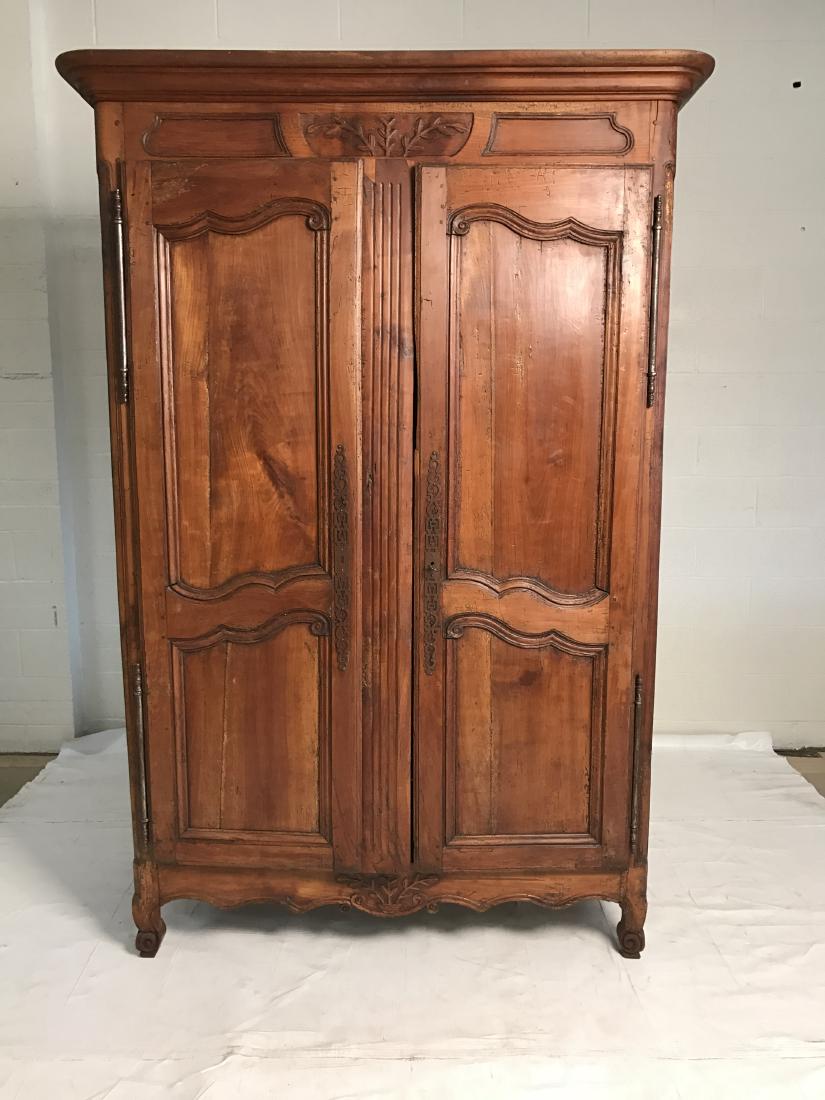 Antique French armoire: Antique French armoire. Property of Bedford estate. Darkwood. Purchased at ABC carpet & home. Dimensions: 84" H 51.5 " W 22.5 D. Interior has 3 removable shelves. Attractive patina and provincial carv