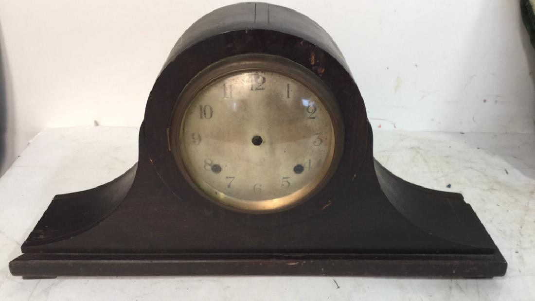 Antique Mantel Clock: Wooden "Dawn" antique mantel clock, collectible, made by The Ansonia Clock Company, NY. Measures approx 10 inches H x 18 inches W.