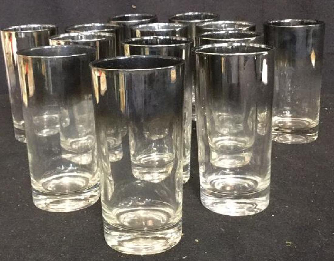 Set of 12 Silver Fade Drinkware Glasses: Set of 12 drinkware glasses in silver fade design. Measures approx 5 3/4 inches tall and approx 2 3/4 inches diameter. Glasses Tableware Drinkware Silver Fade