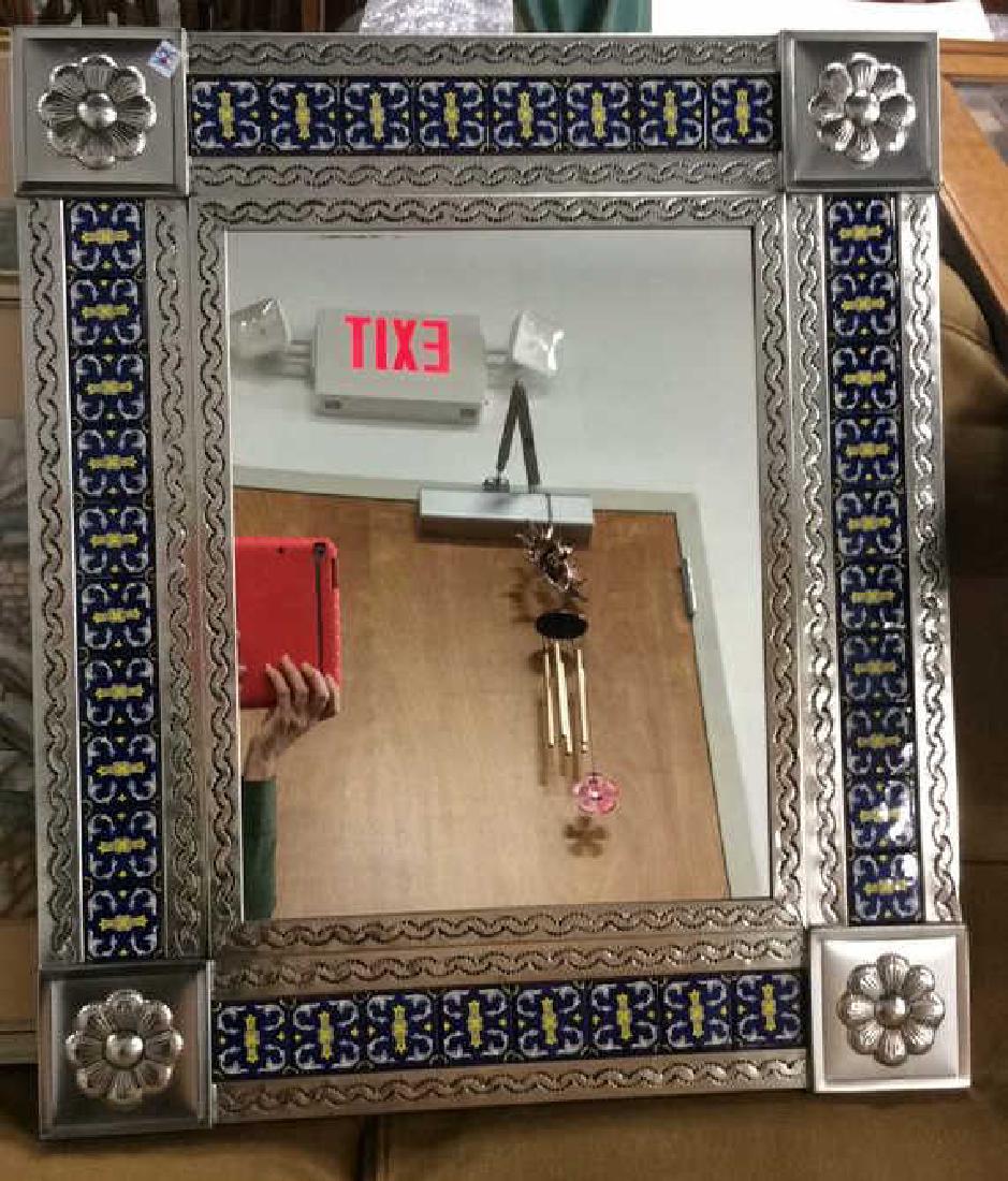 Metal and painted tile Mirror: Aluminum reinforced mirror with corner florets and hand painted tile border. Measures app 29 by 25 inches. Property of Brooklyn Townhouse