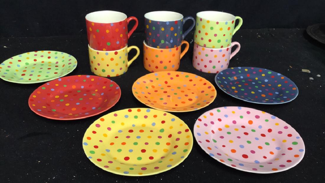 Set of 6 Classic Coffee & Tea Cups And Saucers: 6 cups and 6 saucers in colorful polka dot design. Made by "Classic Coffee & Tea". Saucers measure approx 6 inches in diameter. Cups are approx 2 inches H x 3 inches in diameter.