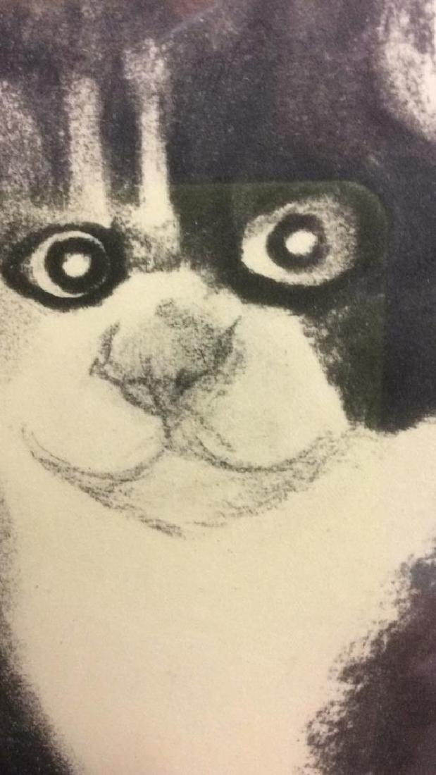 Signed Folk Art Portrait Depicting Tabby Cat: Black and white folk art portrait depicting Tabby cat. Framed and matted, measuring approx 25 inches tall including frame by approx 19 inches wide. Signed on upper left corner for Joe Lasker. Framed A