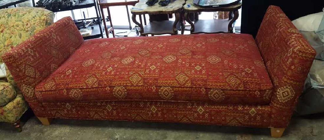 Upholstered Day Bed: Upholstered Day Bed, upholstered head and foot board, main red upholstery with geometric design, box feet, measures 28 inches high by 86 inches wide by 38 inches deep. Property of Katonah Estate