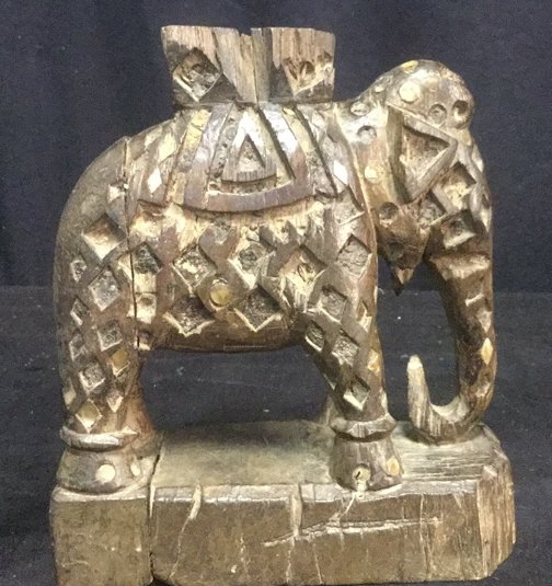 Hand Carved Wood Abalone Elephant Candlestick: Wood, Elephant form candlestick, hand carved and constructed, abalone inlay, weathered/worn style look, Measures approx 8 inches tall by approx 6 1/2 inches wide. Property of Bedford estate.