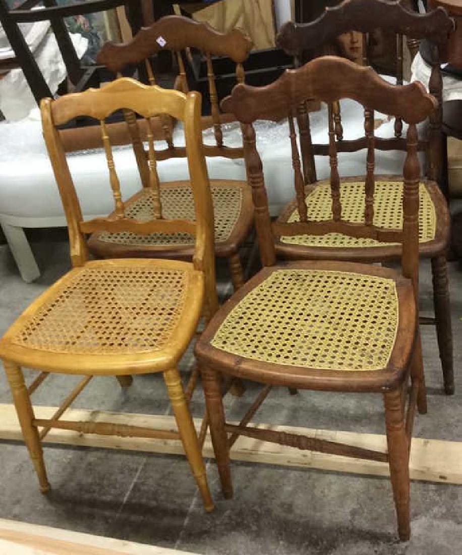 4 Antique Spindle Backed Chairs: Set of four Antique chairs, simple Spindle backs and caned seats. Caning in good condition. Each has slightly different wood stain. Each measures ht app 35 inches width 16 inches, depth 15 inches. Tap