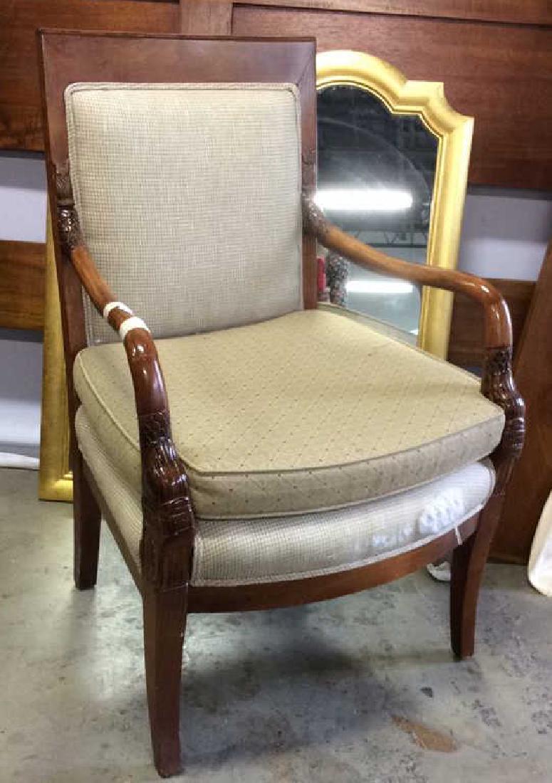 Carved Bergere Arm Chair: Loose upholstered seat tight back with double chording. Upholstery torn on seat front. Carved Walnut frame carved arms and leg tops. Measures ht 37 inches width 24 depth app 22 inches. Property of Rye