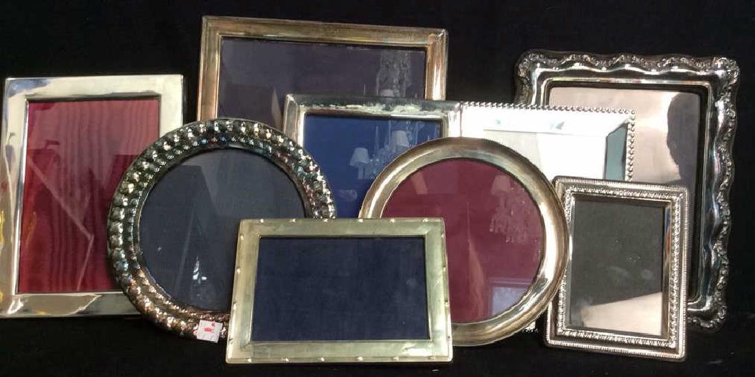 Group 9 Antique Vintage Sterling and SP picture: Group 9 frames Antique, vintage,and newer group Lot of picture frames. Sterling, and more. Largest measures ht 12 inches by9.5 inches. Property of Bedford NewYork Estate