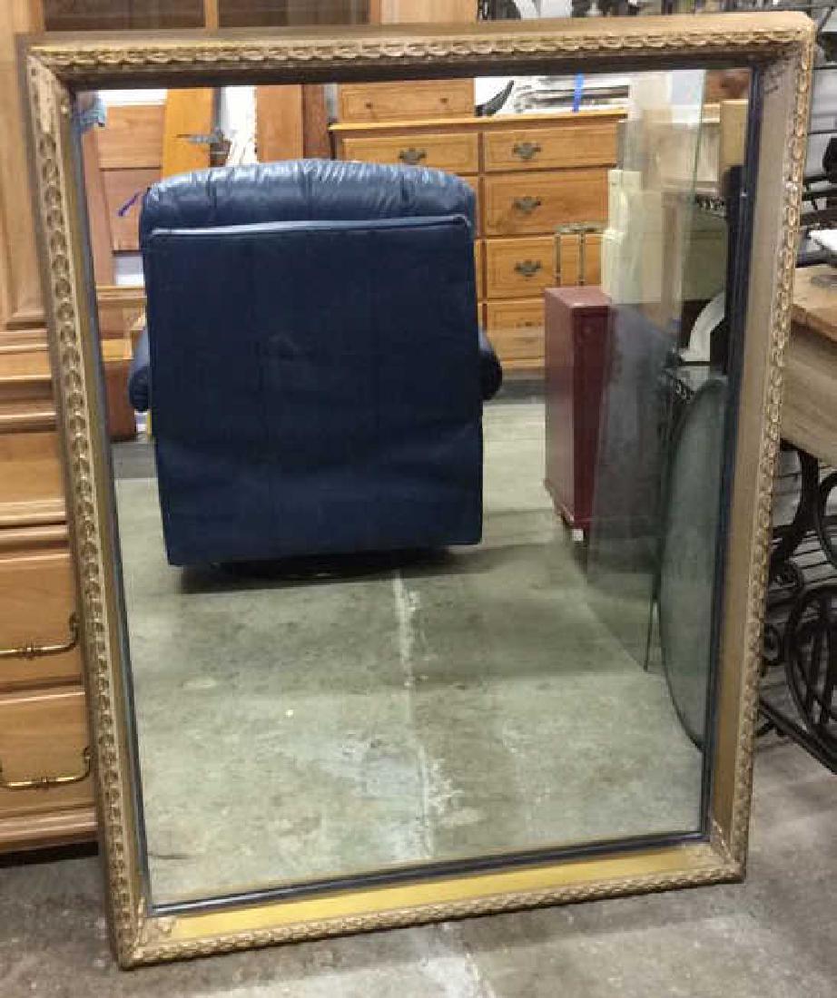 Vintage Carved Gold Painted Mirror: some wear, wood framed mirror, property of Greenwich Estate. measures app 44 by 33 inches.