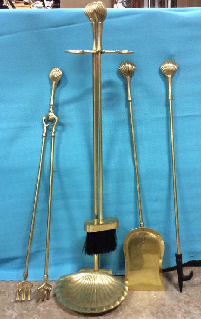 Set Shell Form Brass Fire place Tools: high glass finish to brass, shell finials and stand. set includes stand with shell base, tongs, broom, shovel and poker. measures ht app 34 inches