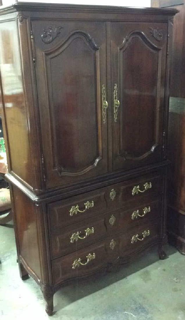 Henredon Mahogany Armoire: henredon mahogany armoire, high gloss finish, brass hardware, good condition. measures ht 88 inches depth 19 inches. width 39 inches. property of Bedford Estate. two door cabinet opens to shelves thre