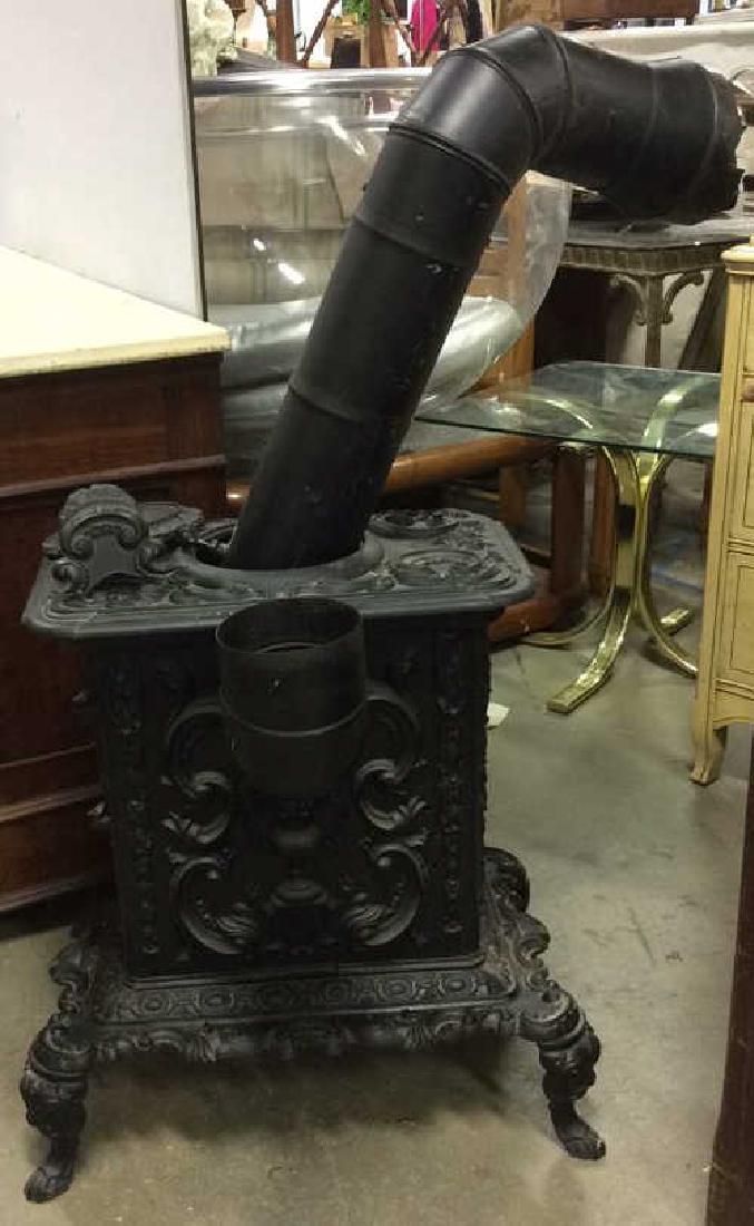 Antique Black Metal Iron Stove: marked for Lady Washington one one side and on other Anthony Davy, & Co. Troy, New York No 3, Patented 1848. ornate scrollwork. possibly Victorian. one foot needs re attachment. property of Bedford Es