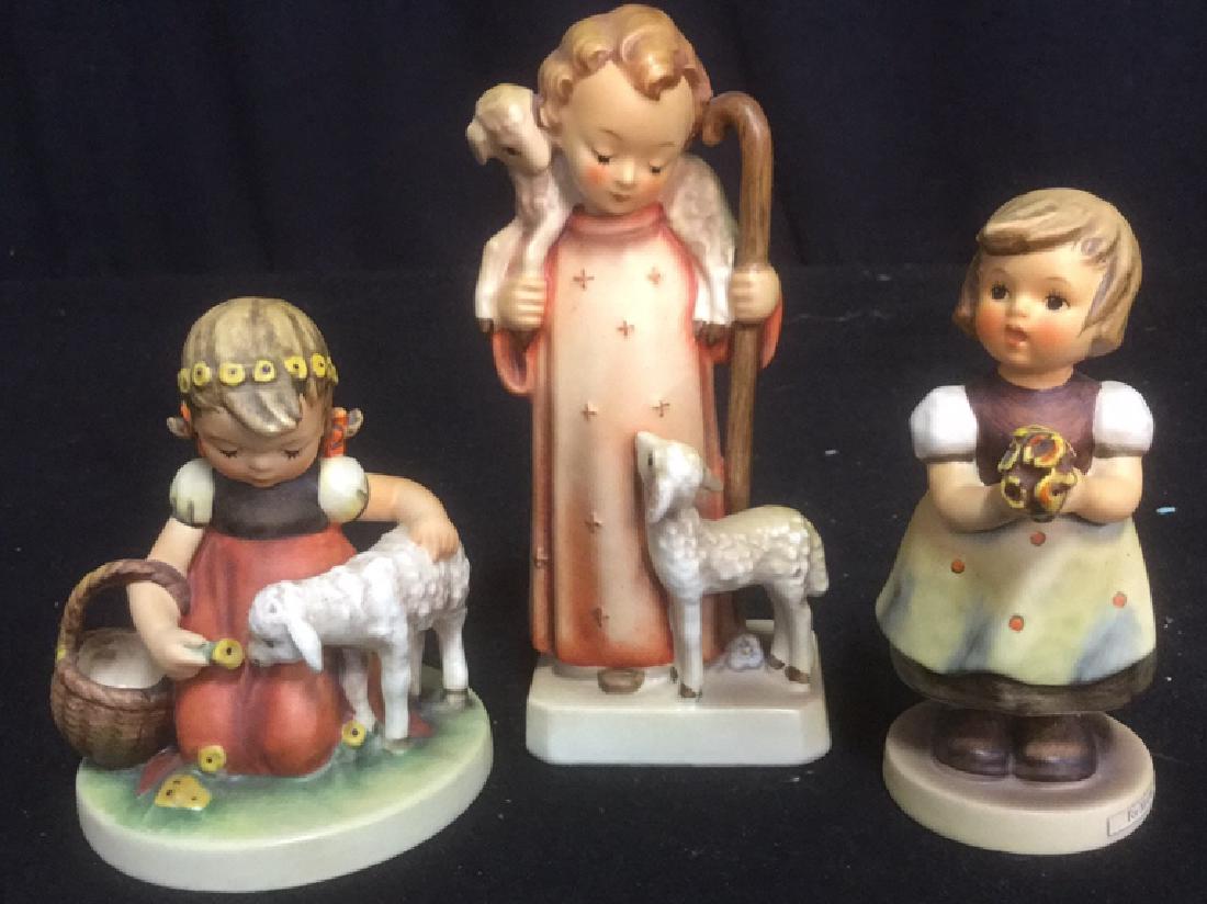 Group 3 Goebels Sheperd Child w Lamb and w Flowers: Group lot 3 Goebels. Tallest measures approx 6 inches tall. No conditions issues noted.